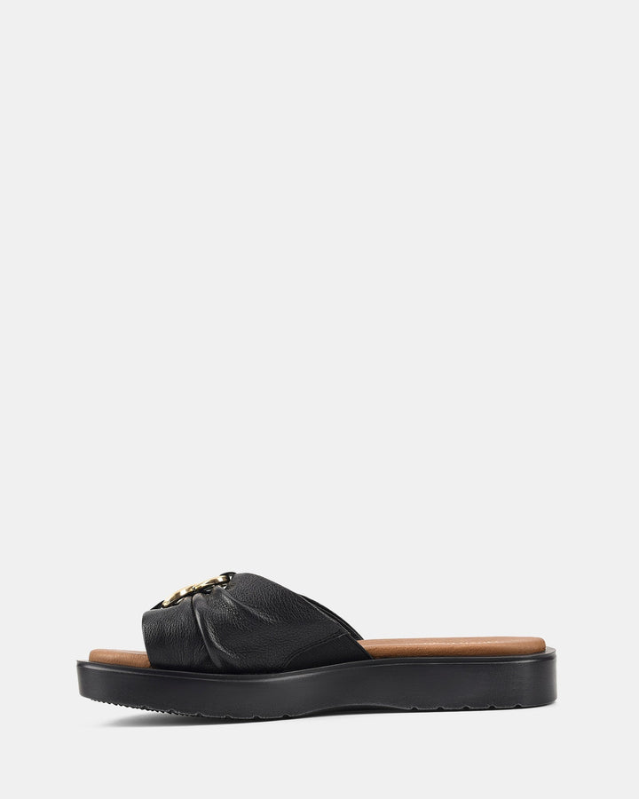 Women's Black Sandals with Wavy Sole and Gold Buckle