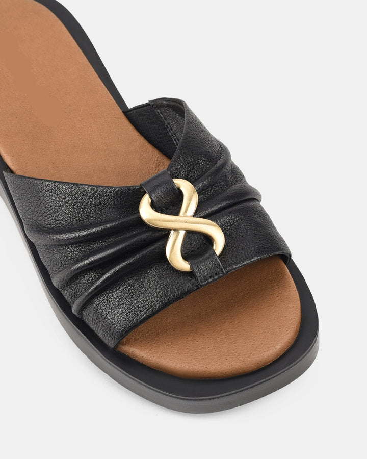 Women's Black Sandals with Wavy Sole and Gold Buckle