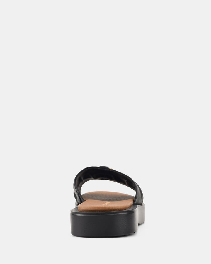 Women's Black Sandals with Wavy Sole and Gold Buckle