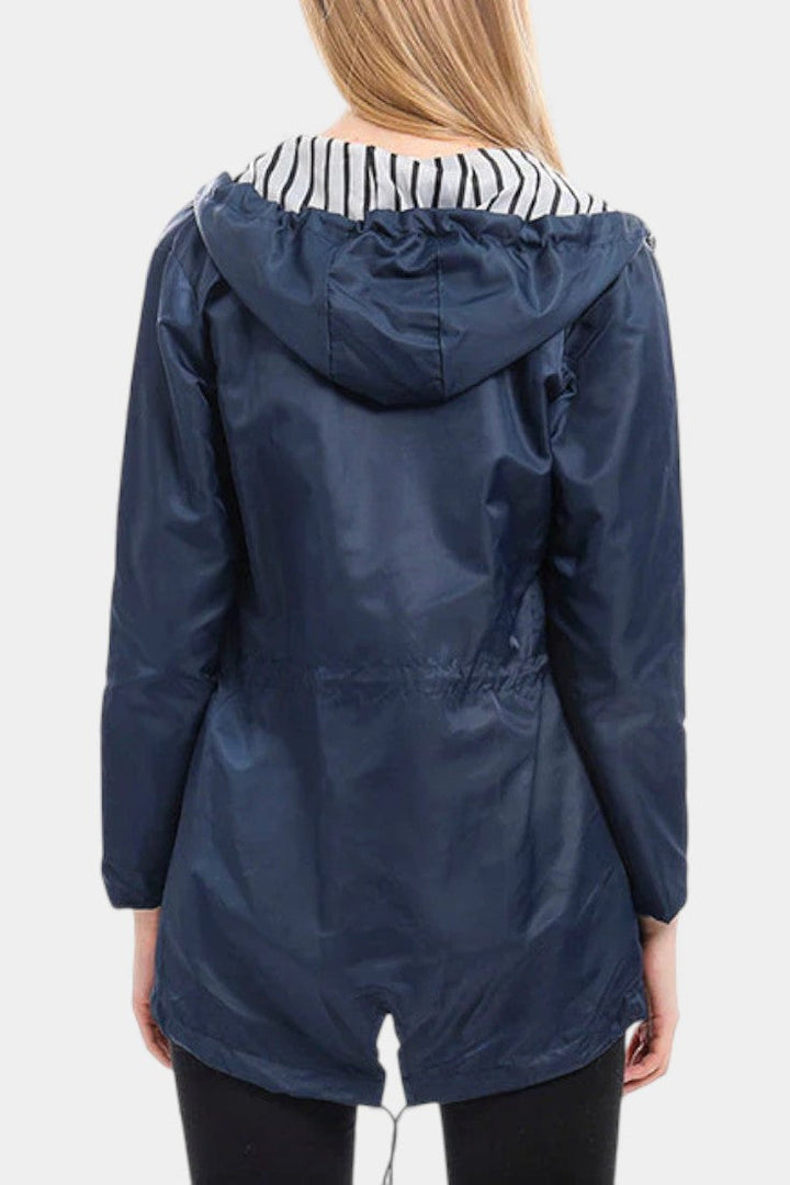 Aria Waterproof Jacket Featuring an Adjustable Hood