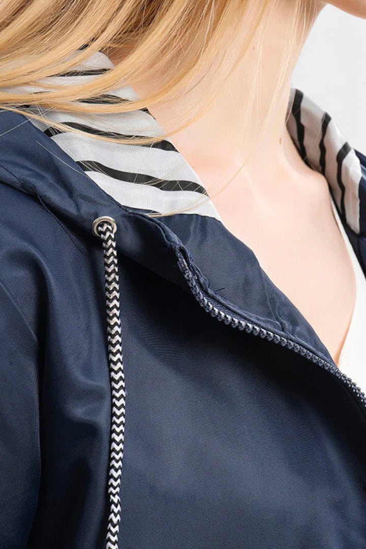 Aria Waterproof Jacket Featuring an Adjustable Hood